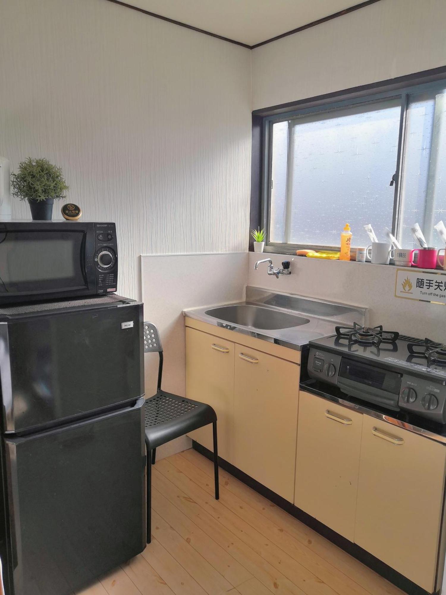 Nippori Nishi-tengachaya Guesthouse西天下茶屋アパートメント Appart hôtel *