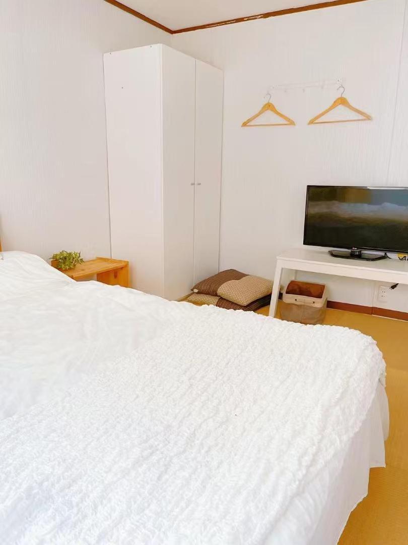 Nippori Nishi-tengachaya Guesthouse西天下茶屋アパートメント Appart hôtel *