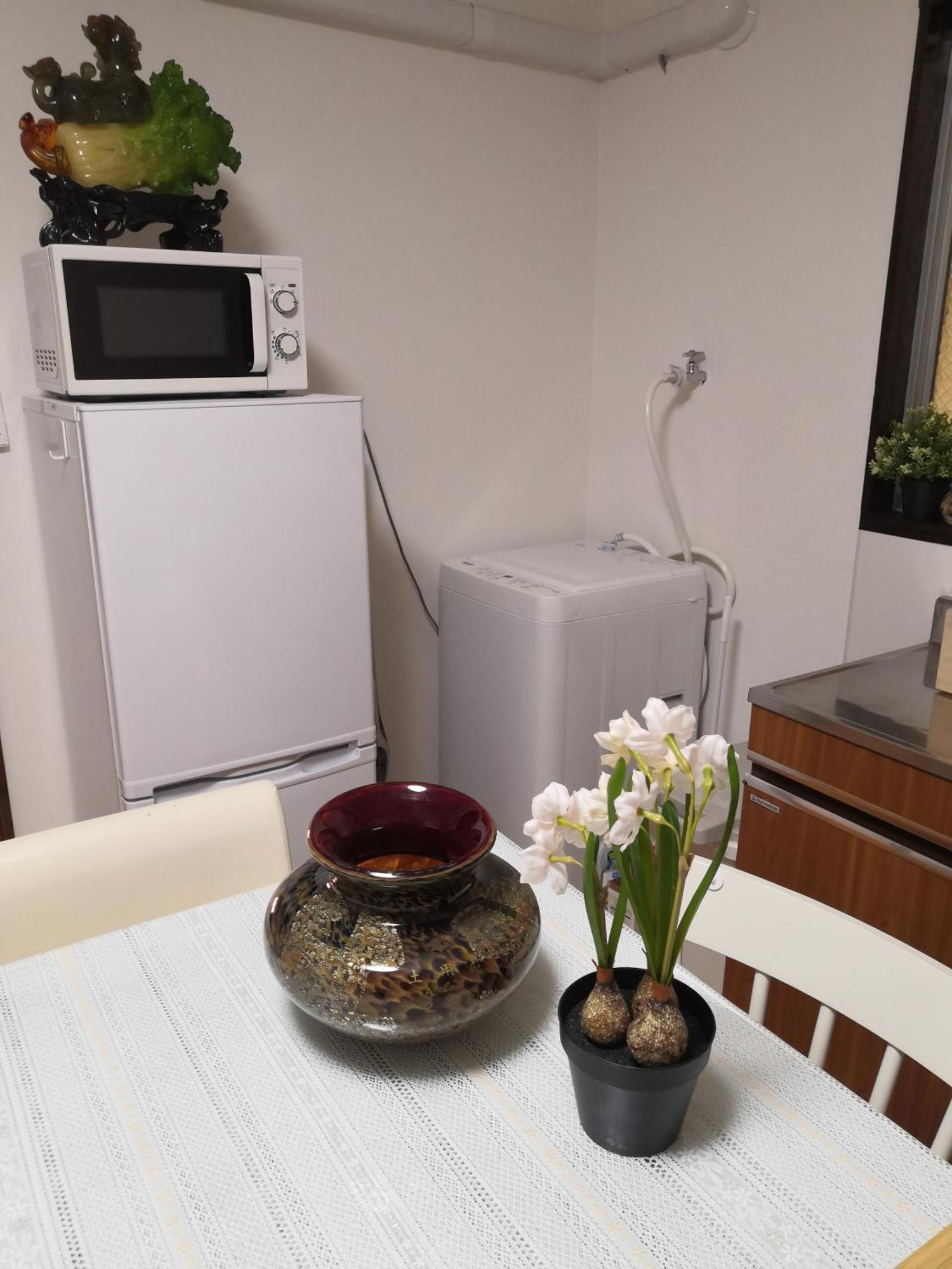 Nippori Nishi-tengachaya Guesthouse西天下茶屋アパートメント Ōsaka